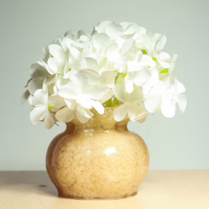 Handcrafted diffusers and vases made from recycled textiles.