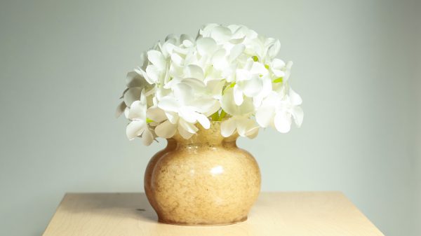 Handcrafted diffusers and vases made from recycled textiles.