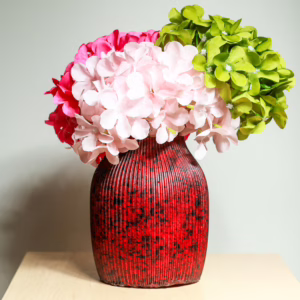 Handcrafted diffusers and vases made from recycled textiles.